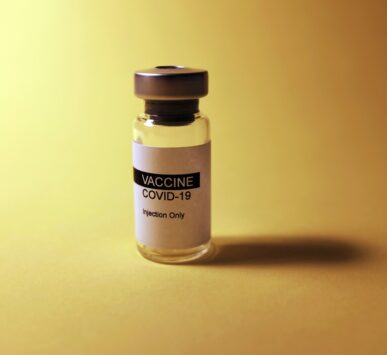 white and black labeled bottle
